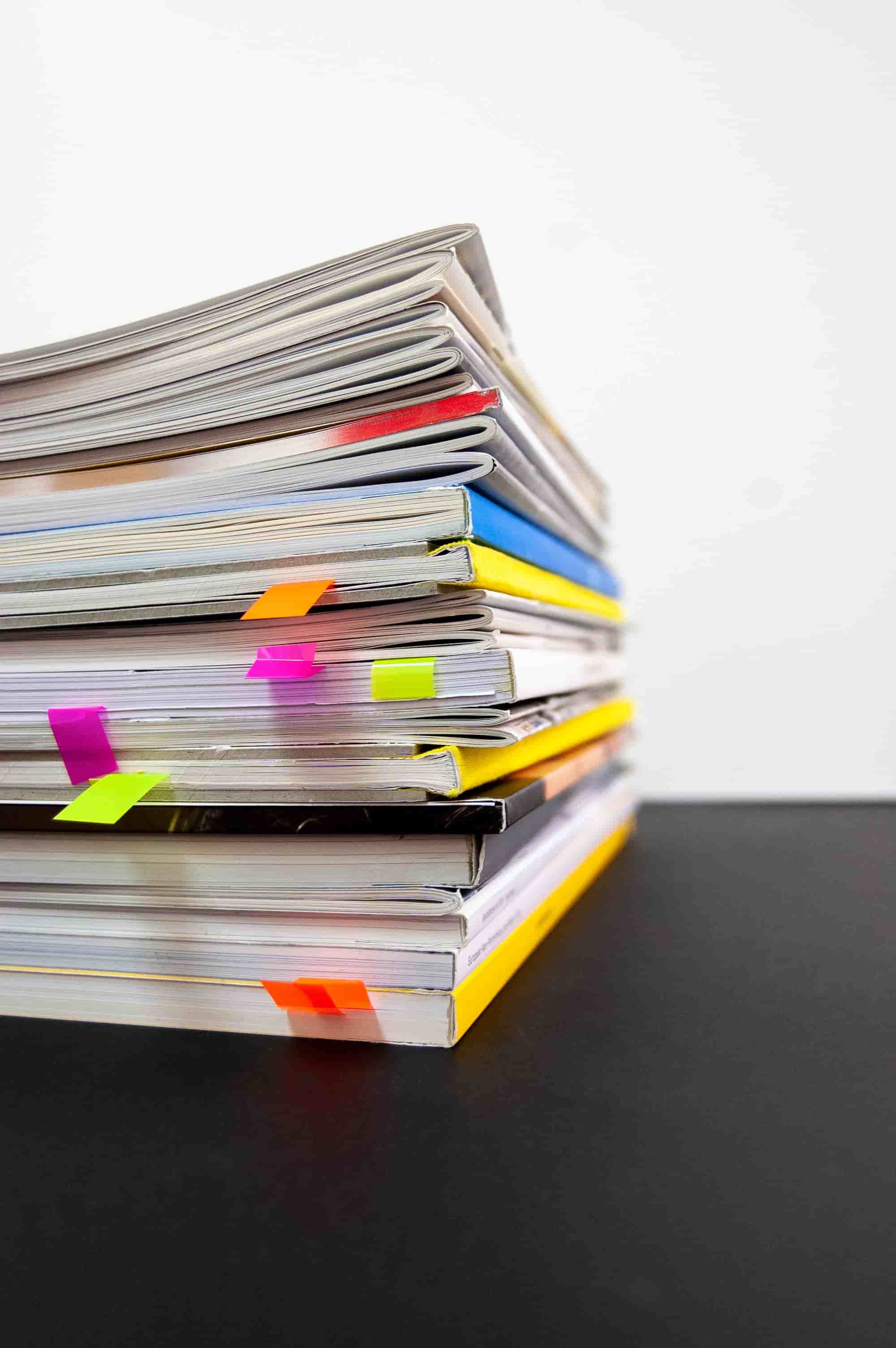 many notebooks marked with colorful dividers